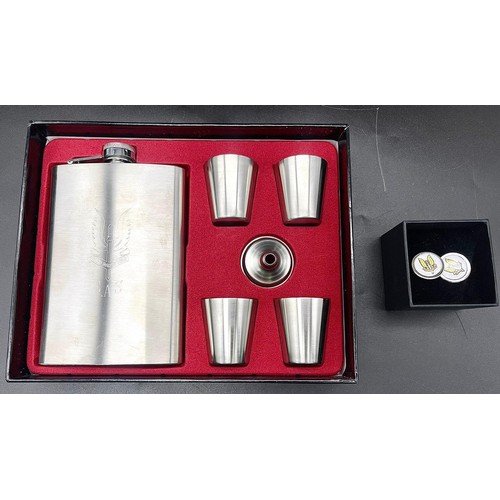 238 - An SAS engraved (WHO DARES WINS) white metal hip flask with four cups and filling funnel in original... 