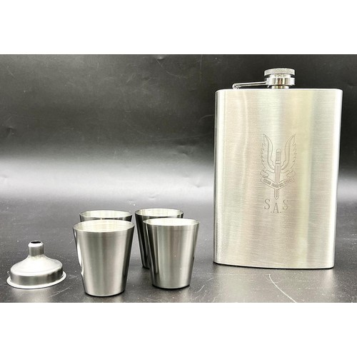 238 - An SAS engraved (WHO DARES WINS) white metal hip flask with four cups and filling funnel in original... 