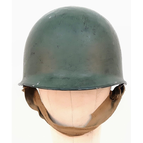 1329 - 1.US Army M1 steel helmet with liner. Late WW2 period (swivel bales and rear seam). Leather parts of... 