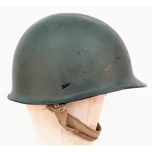 1329 - 1.US Army M1 steel helmet with liner. Late WW2 period (swivel bales and rear seam). Leather parts of... 