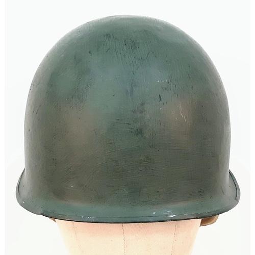 1329 - 1.US Army M1 steel helmet with liner. Late WW2 period (swivel bales and rear seam). Leather parts of... 