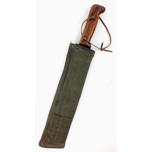 1336 - British Army 1944 pattern machete (the “Jungle Beater”) with sheath, as issued to troops serving in ... 