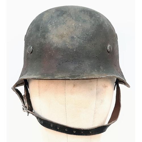 247 - WITHDRAWN
A Waffen SS Single Decal Helmet with Normandy Camo.