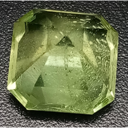 783 - A 3.20ct Octagon Shaped, Natural Pakistan, Green-Yellow Peridot Step Cut Gemstone. Complete with GFC... 