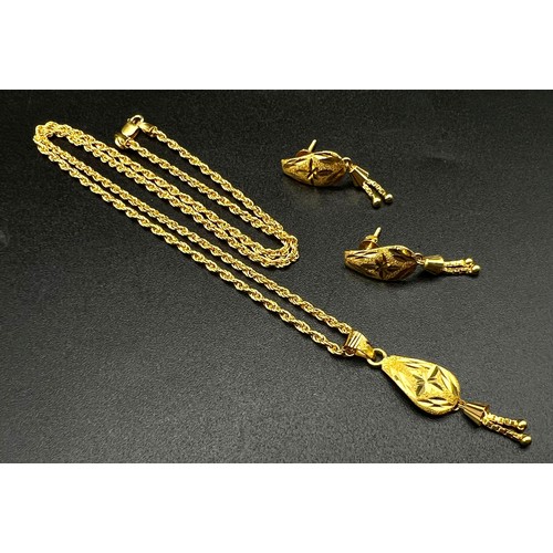 167 - An 18 K yellow gold chain with pendant and assorted earrings. Total weight: 4.6 g REF: 00004369