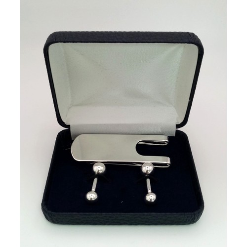 1502 - A 925 Silver Money Clip with a Pair of White Metal Dumbbell Cufflinks.