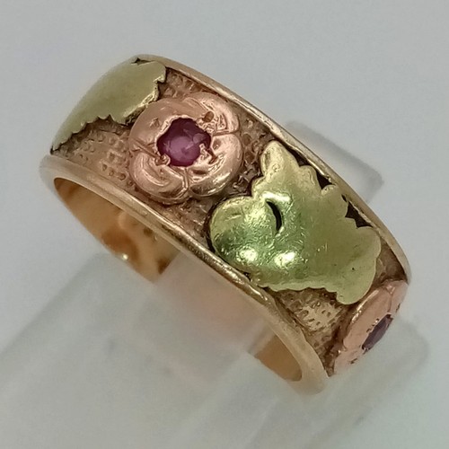 756 - An Antique 18K (tested)Yellow and Rose Gold Ring. Four ruby gemstone decoration. Size J. 5.83g total... 