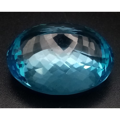 297 - A 99.95ct Swiss Blue Oval, Blue Topaz Gemstone. Comes with GFCO Certificate.