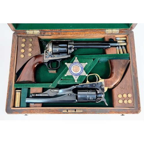 1257 - A Pair of 18609mm Blank firing Uberti Model 1830Colt Revolvers. Comes in Presentation box with blank... 