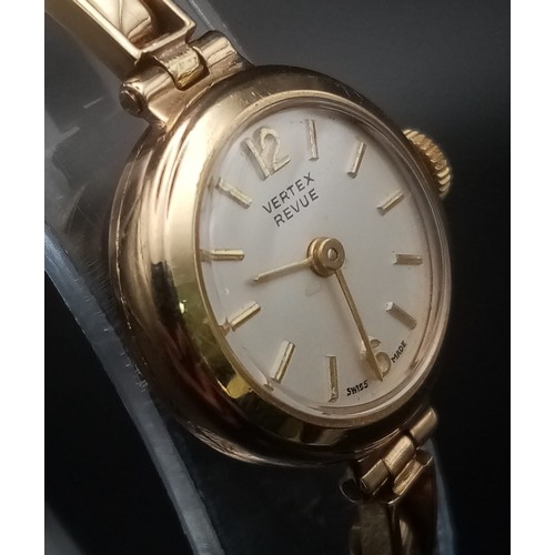 736 - A Vintage Vertex Revue 9K Gold Watch. Gold expandable bracelet and case - 18mm. White dial. Mechanic... 