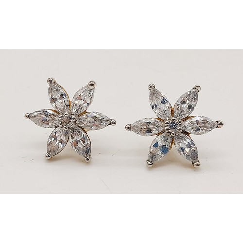 1279 - A Pair of Stunning 9K Gold Star Burst CZ Earrings. 2.6g total weight.