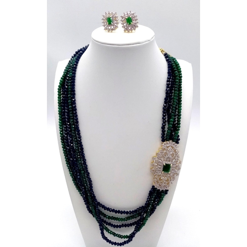 140 - A glorious necklace and earrings set, the necklace consisting of five alternating strands of faceted... 