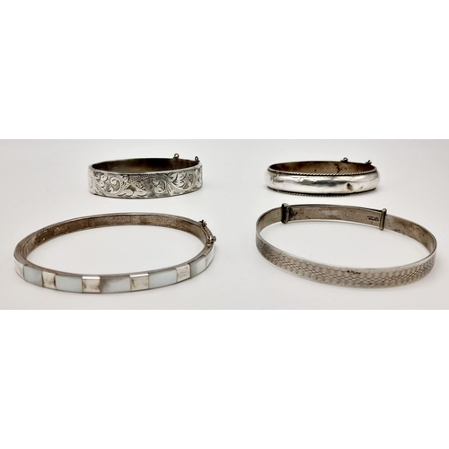 484 - A Selection of 4 925 Silver Bangles. Total Weight 56.78grams