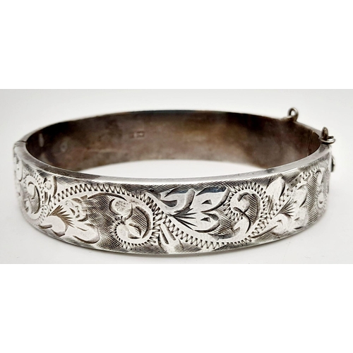 484 - A Selection of 4 925 Silver Bangles. Total Weight 56.78grams