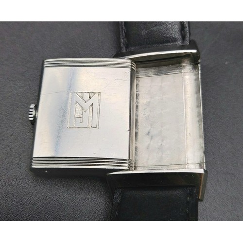 368 - A JAEGER - LE COULTRE watch with the initial JM on the reverse. 33 x 23 mm case, white metal bezel, ... 