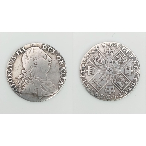 489 - A 1787 George III Silver Shilling Coin. 25mm diameter. 5.9g
Please see photos for conditions.