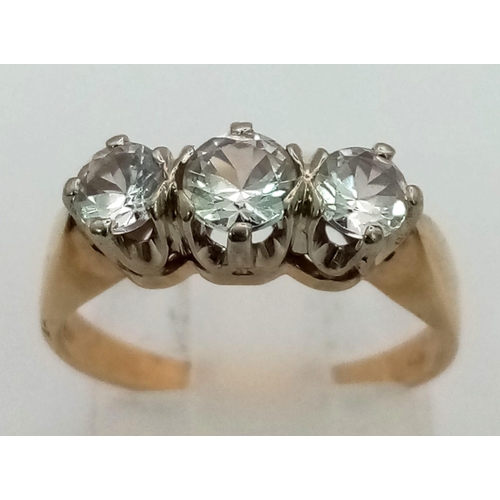 493 - A 14K Yellow Gold Three White Stone Ring. Size J. 3.1g total weight.