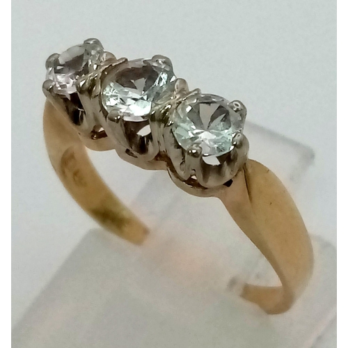 493 - A 14K Yellow Gold Three White Stone Ring. Size J. 3.1g total weight.