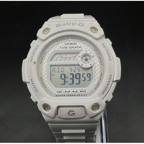 485 - A Casio Baby G Digital Watch. White rubber strap. Case - 41mm. In good condition and working order.