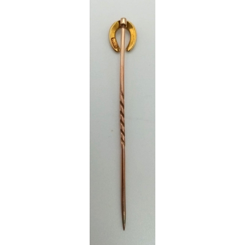 505 - An Antique Victorian 15K Gold and Horseshoe Pearl Stickpin.
5cm.