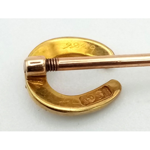 505 - An Antique Victorian 15K Gold and Horseshoe Pearl Stickpin.
5cm.