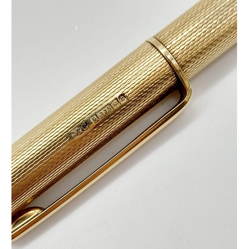 78 - A Vintage 9K Yellow Gold Perfect Point Mechanical Pencil. Machine tooled decoration. 12cm. 23g total... 