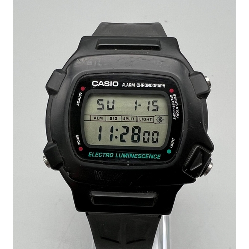 763 - A Casio Alarm Chronograph Digital Watch. Black rubber strap. In working order.