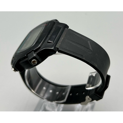 763 - A Casio Alarm Chronograph Digital Watch. Black rubber strap. In working order.