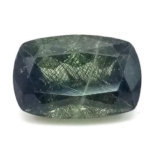 747 - A Rare 4.63ct Rutilated Peridot. Cushion cut, and comes with a GGI Certificate.