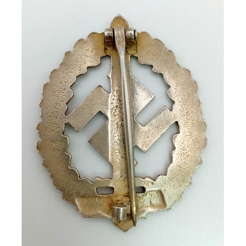 85 - WW2 German SA Disabled Veterans Sports Badge. A silver grade example depicting a Roman broad sword, ... 