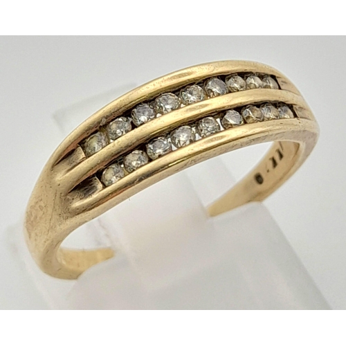 779 - 9K YELLOW GOLD 2 ROW DIAMOND RING. TOTAL WEIGHT 2.7G SIZE M