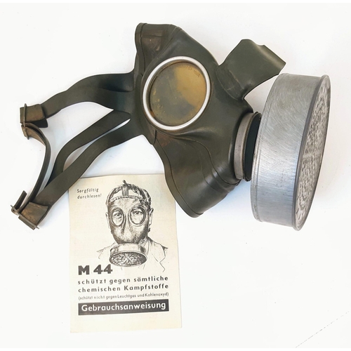 1098 - WW2 German Civilian Gas Mask with the original hard to find instruction leaflet.