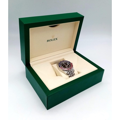 4 - A Rolex GMT - Master II Pepsi Gents Watch. Stainless steel strap and case - 40mm. Ceramic Pepsi-colo... 