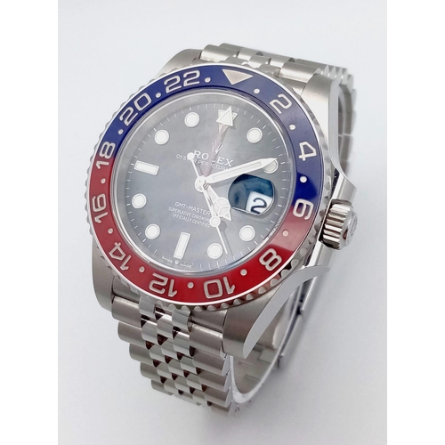 4 - A Rolex GMT - Master II Pepsi Gents Watch. Stainless steel strap and case - 40mm. Ceramic Pepsi-colo... 