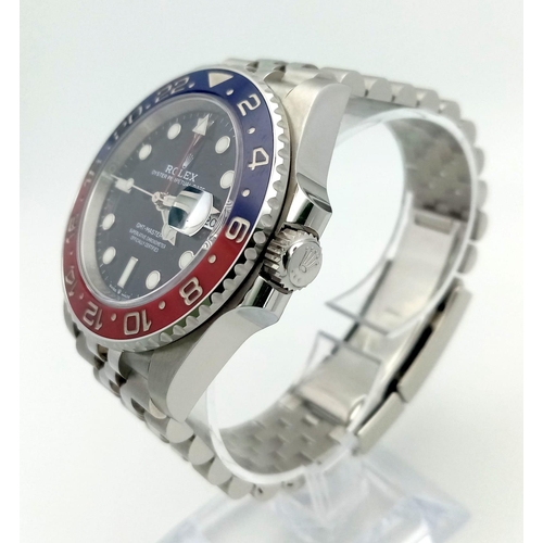 4 - A Rolex GMT - Master II Pepsi Gents Watch. Stainless steel strap and case - 40mm. Ceramic Pepsi-colo... 