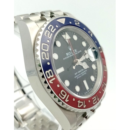 4 - A Rolex GMT - Master II Pepsi Gents Watch. Stainless steel strap and case - 40mm. Ceramic Pepsi-colo... 