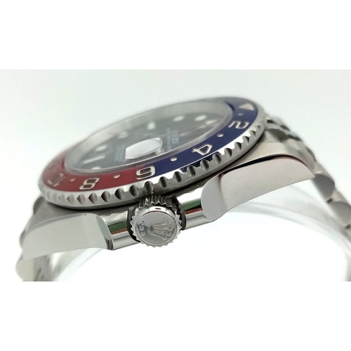 4 - A Rolex GMT - Master II Pepsi Gents Watch. Stainless steel strap and case - 40mm. Ceramic Pepsi-colo... 