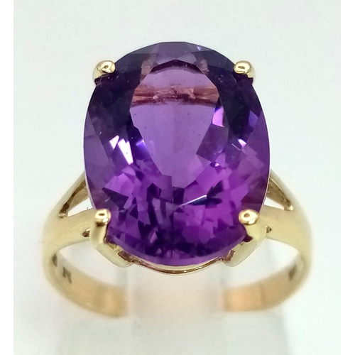 500 - A Vintage 14K Yellow Gold Amethyst Ring. Large, (3ct) clean, oval-cut amethyst. Size K. 2.64g total ... 