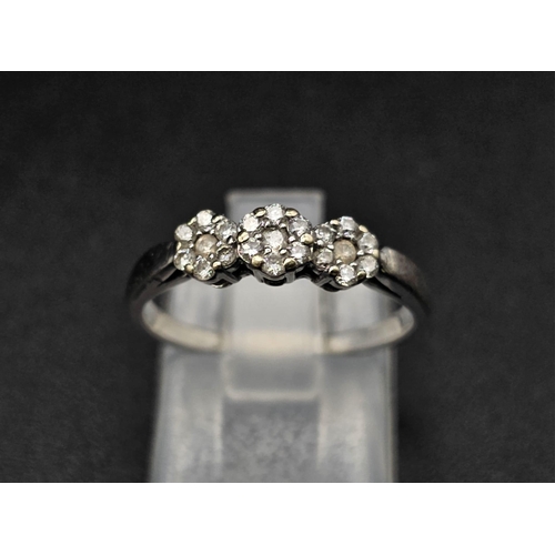 159 - 18k white gold diamond cluster trilogy ring 2.4g (dia:0.25ct) size M