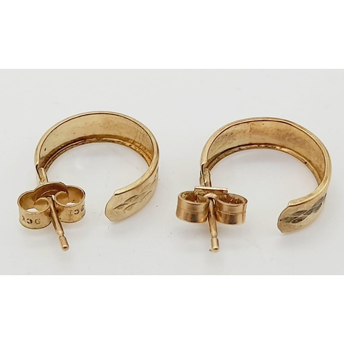 1101 - A pair of hoop 9k gold earrings. 0.97g total weight.