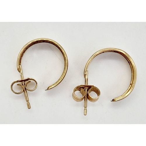 1101 - A pair of hoop 9k gold earrings. 0.97g total weight.