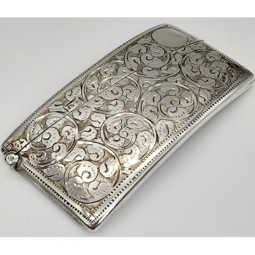 507 - An Antique 925 Silver Card Case. Swirl engraved decoration. Hallmarks for Birmingham 1898. 8 x 4cm. ... 