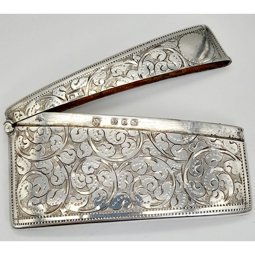 507 - An Antique 925 Silver Card Case. Swirl engraved decoration. Hallmarks for Birmingham 1898. 8 x 4cm. ... 