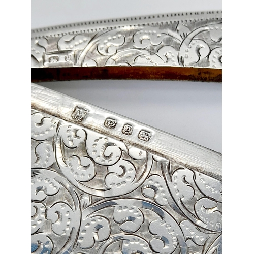 507 - An Antique 925 Silver Card Case. Swirl engraved decoration. Hallmarks for Birmingham 1898. 8 x 4cm. ... 