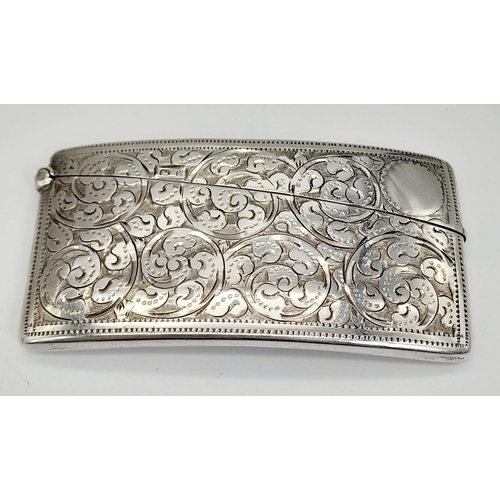 507 - An Antique 925 Silver Card Case. Swirl engraved decoration. Hallmarks for Birmingham 1898. 8 x 4cm. ... 