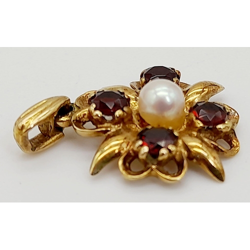 1292 - A Vintage 9k Yellow Gold Garnet and Pearl Pendant. 2cm. 1.71g total weight.