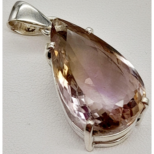 1291 - An Ametrine Pear-Shape Pendant and Matching Oval Ring. Set in 925 Silver with over 30ct of Ametrine.... 