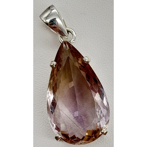 1291 - An Ametrine Pear-Shape Pendant and Matching Oval Ring. Set in 925 Silver with over 30ct of Ametrine.... 