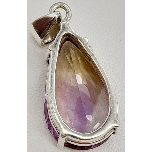 1291 - An Ametrine Pear-Shape Pendant and Matching Oval Ring. Set in 925 Silver with over 30ct of Ametrine.... 