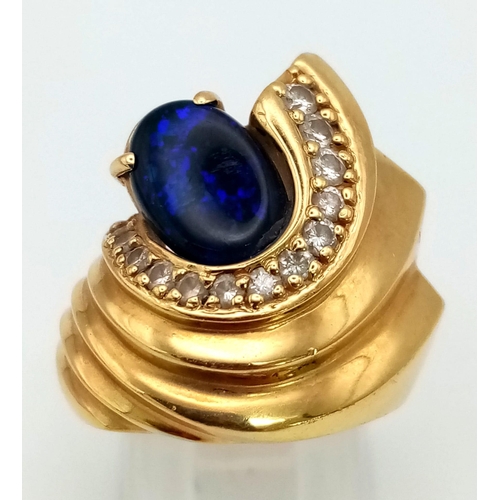 1295 - A Glamorous Vintage 18K Yellow Gold, Diamond and Lapis Lazuli Ladies Ring. A stunning central purple... 